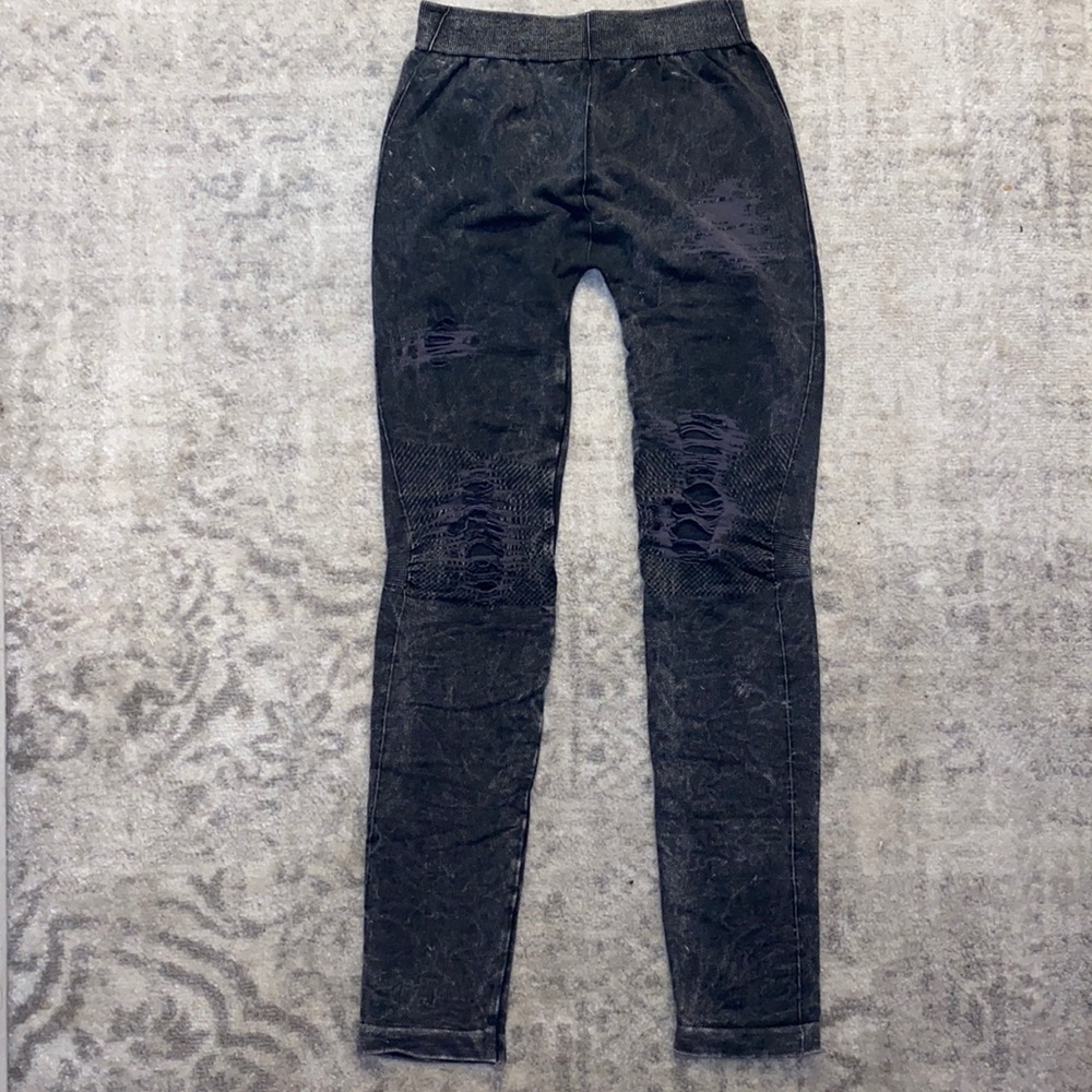 Ripped faux denim leggings.